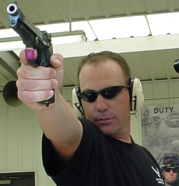 TSgt Bush on the firing line with his M9