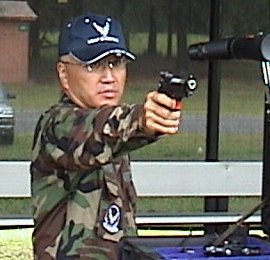 Col Chang on the firing line with his M9